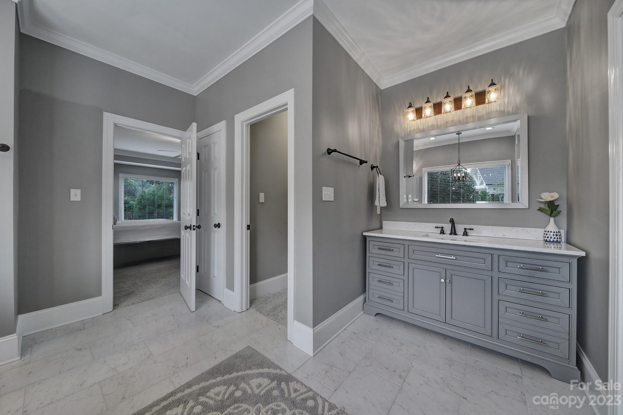 112 Old Post Road Mooresville, NC 28117 - Photo 15 of 42 a bathroom with a double vanity sink mirror and bathtub