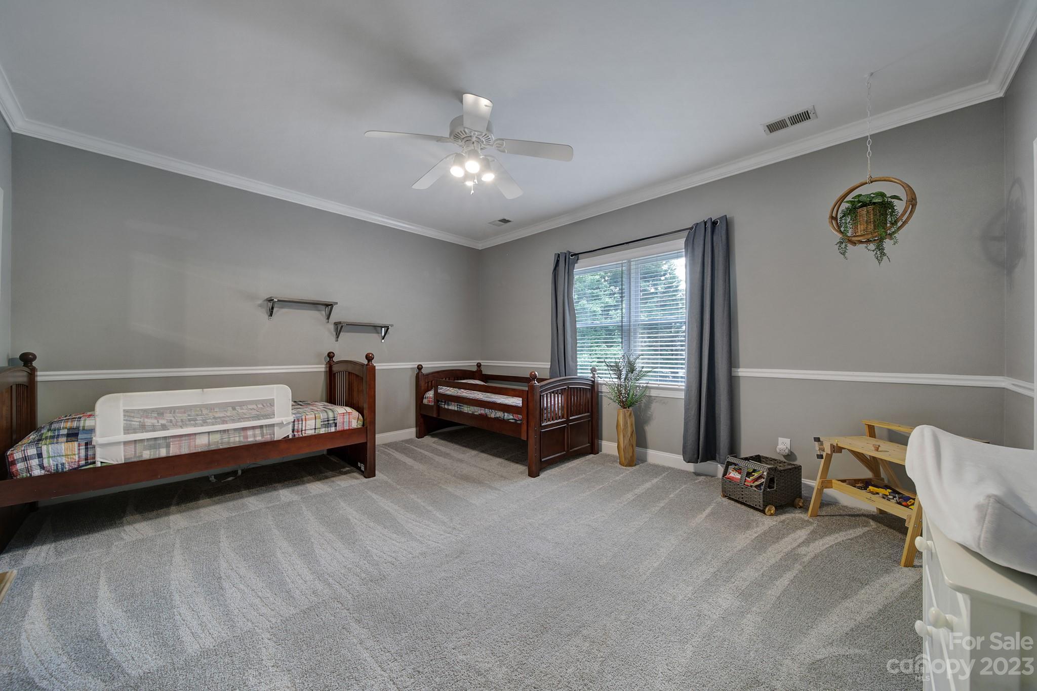 112 Old Post Road Mooresville, NC 28117 - Photo 17 of 42 a bedroom with furniture and a window