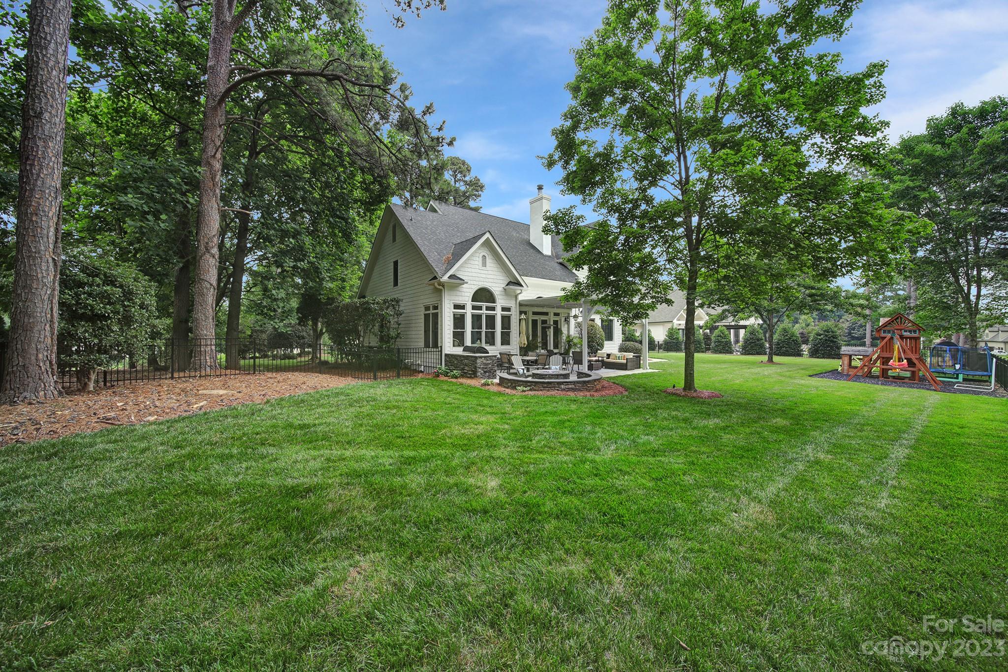 112 Old Post Road Mooresville, NC 28117 - Photo 30 of 42 a view of a house with backyard and a tree