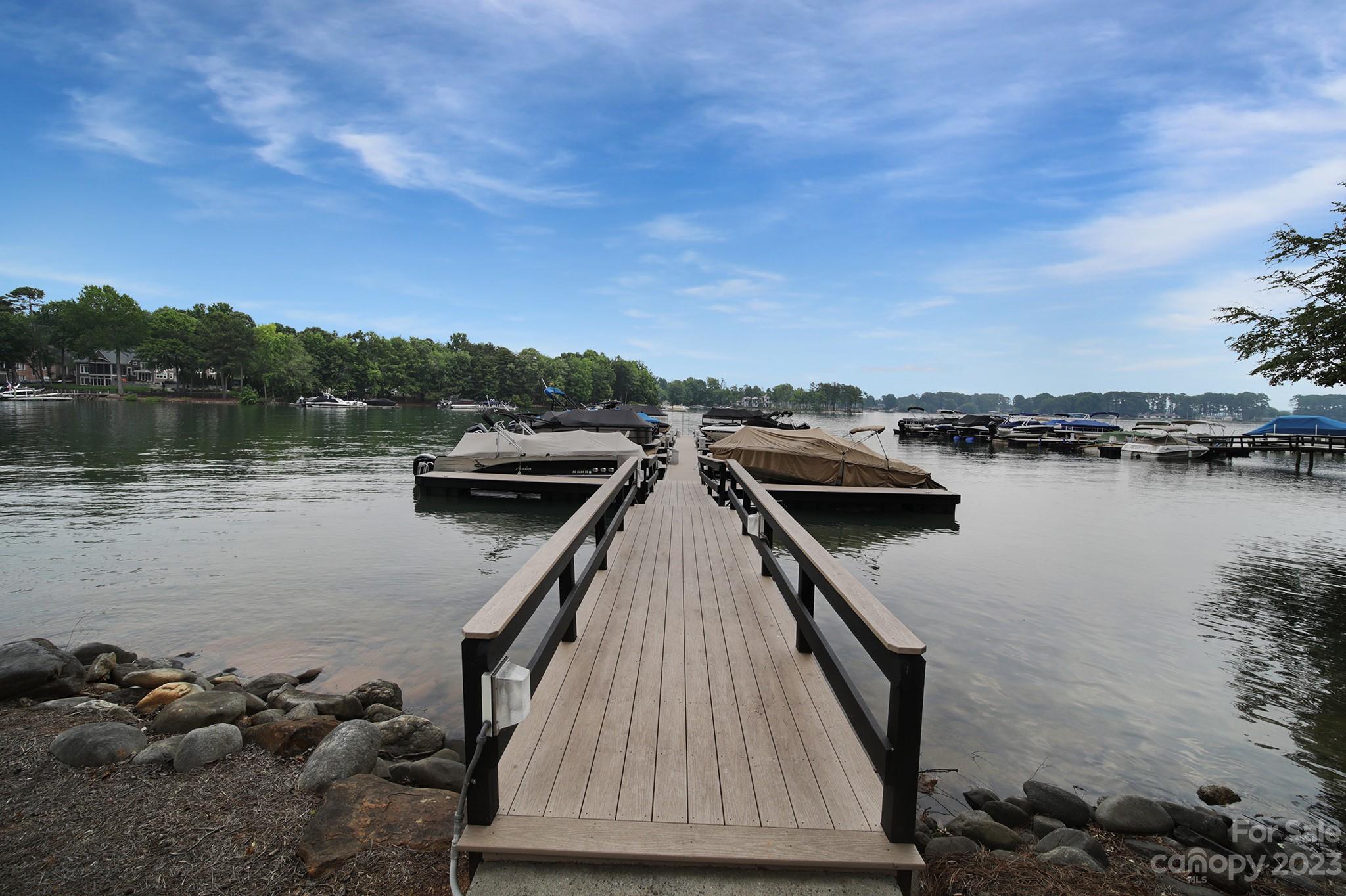 112 Old Post Road Mooresville, NC 28117 - Photo 34 of 42 a view of a lake with a car parked