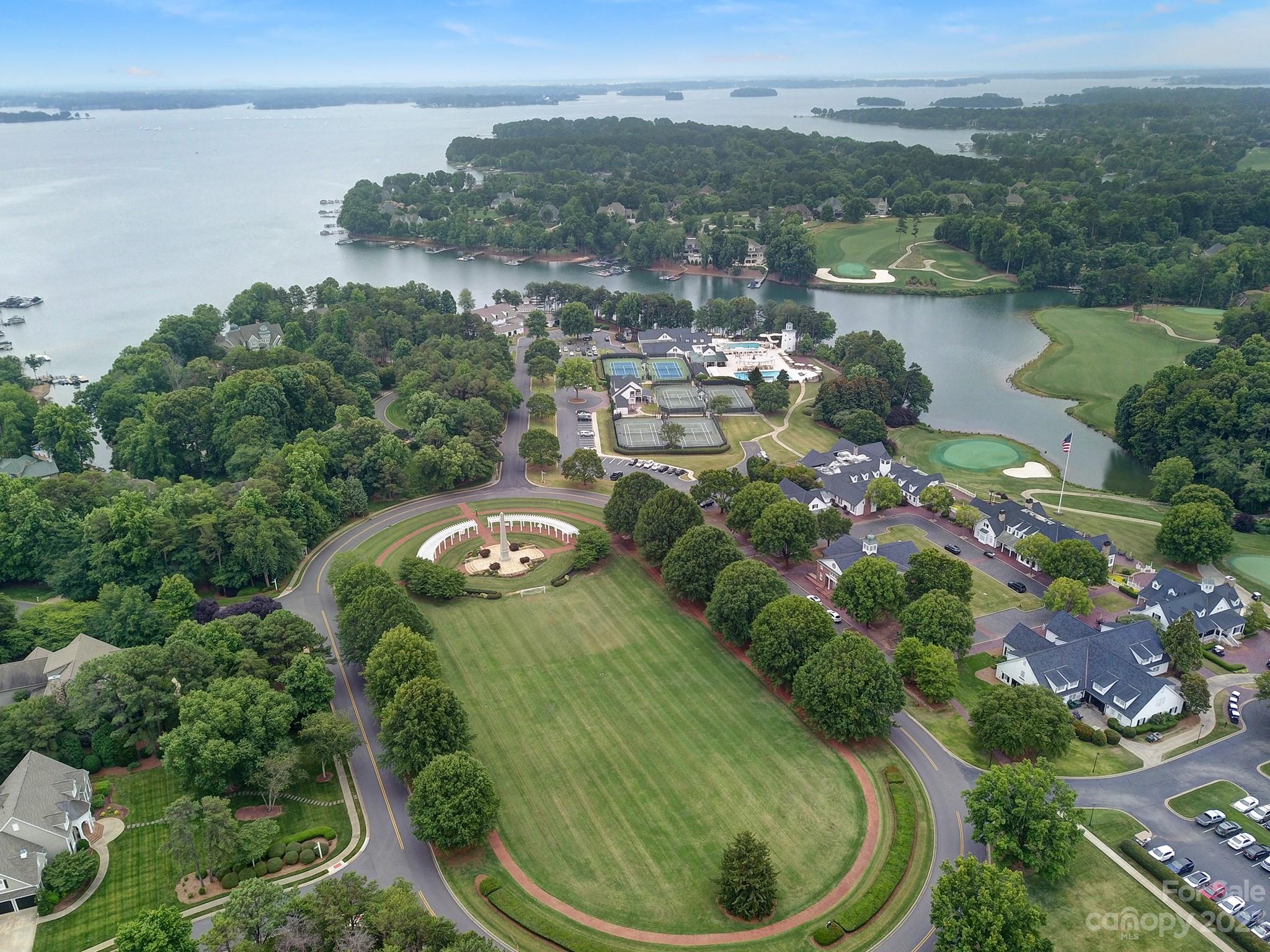112 Old Post Road Mooresville, NC 28117 - Photo 38 of 42 a view of a lake with a city view