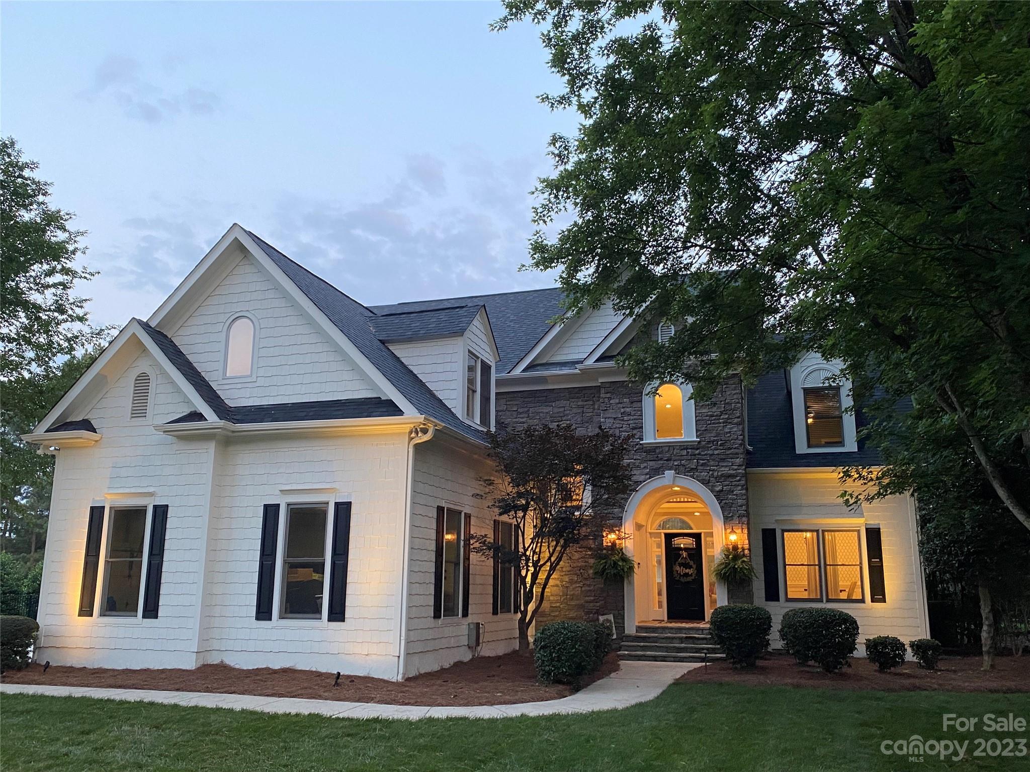 112 Old Post Road Mooresville, NC 28117 - Photo 41 of 42 a front view of a house with a yard