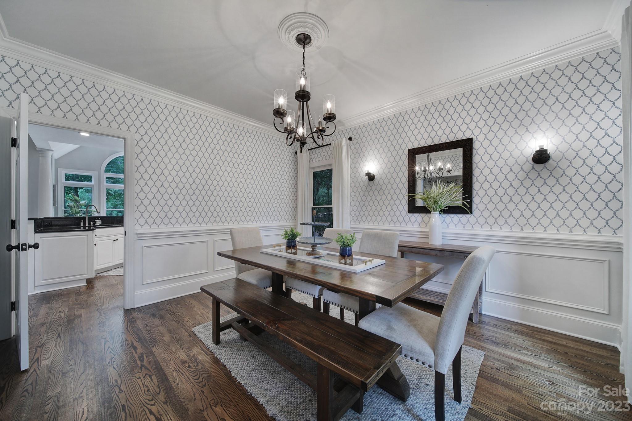 112 Old Post Road Mooresville, NC 28117 - Photo 10 of 42 a view of a dining room with furniture and wooden floor