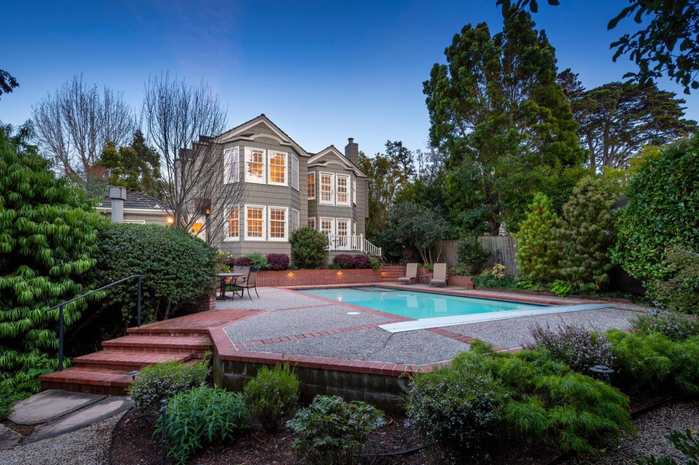 549 Edgewood Road San Mateo, CA 94402 - Photo 2 of 44 a front view of a house with yard and green space