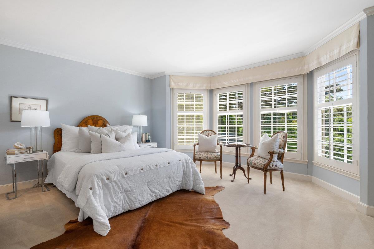 549 Edgewood Road San Mateo, CA 94402 - Photo 27 of 44 a bedroom with bed and glass window