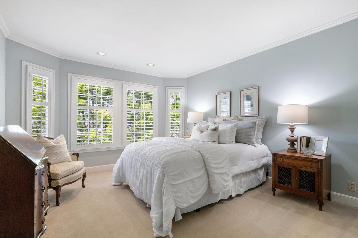 549 Edgewood Road San Mateo, CA 94402 - Photo 29 of 44 a bedroom with a bed and a couch