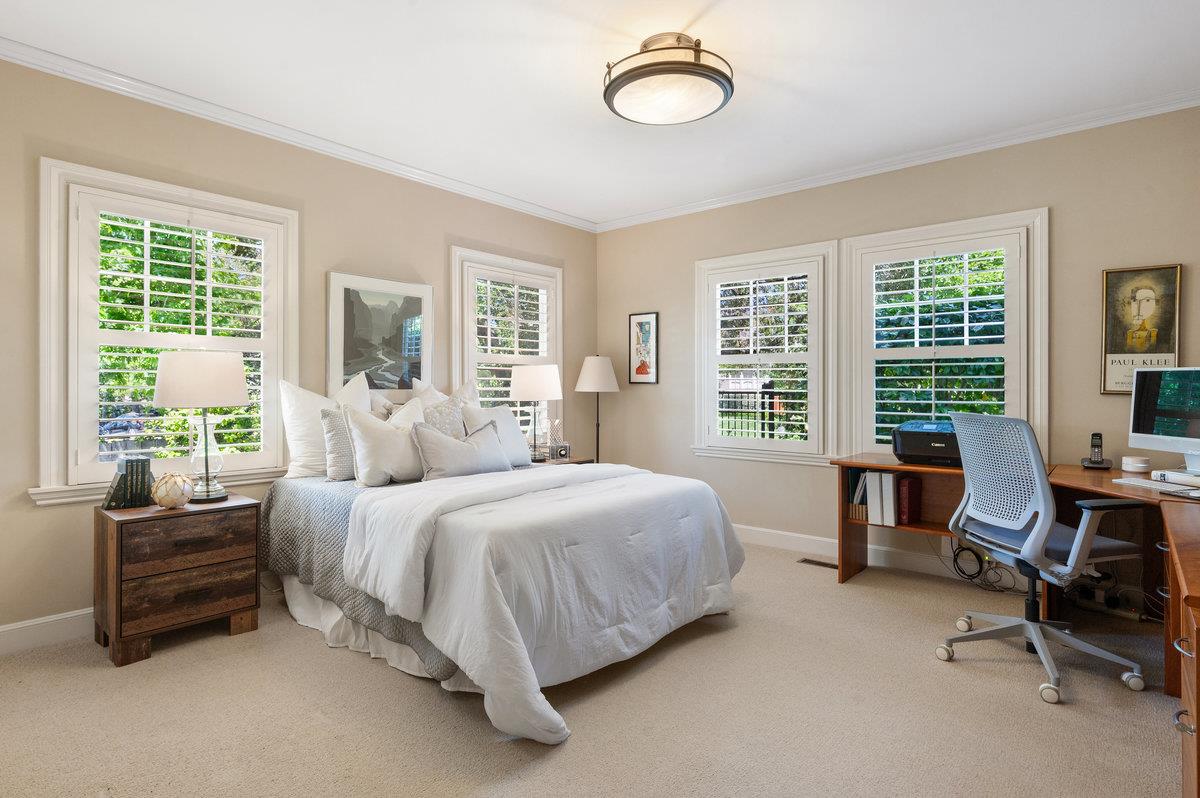 549 Edgewood Road San Mateo, CA 94402 - Photo 32 of 44 a bedroom with a bed and a couch