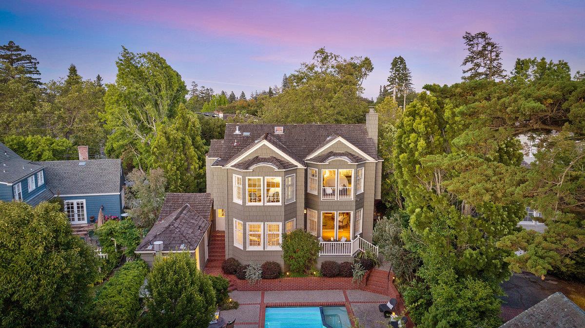 549 Edgewood Road San Mateo, CA 94402 - Photo 36 of 44 a front view of a house with a yard and potted plants