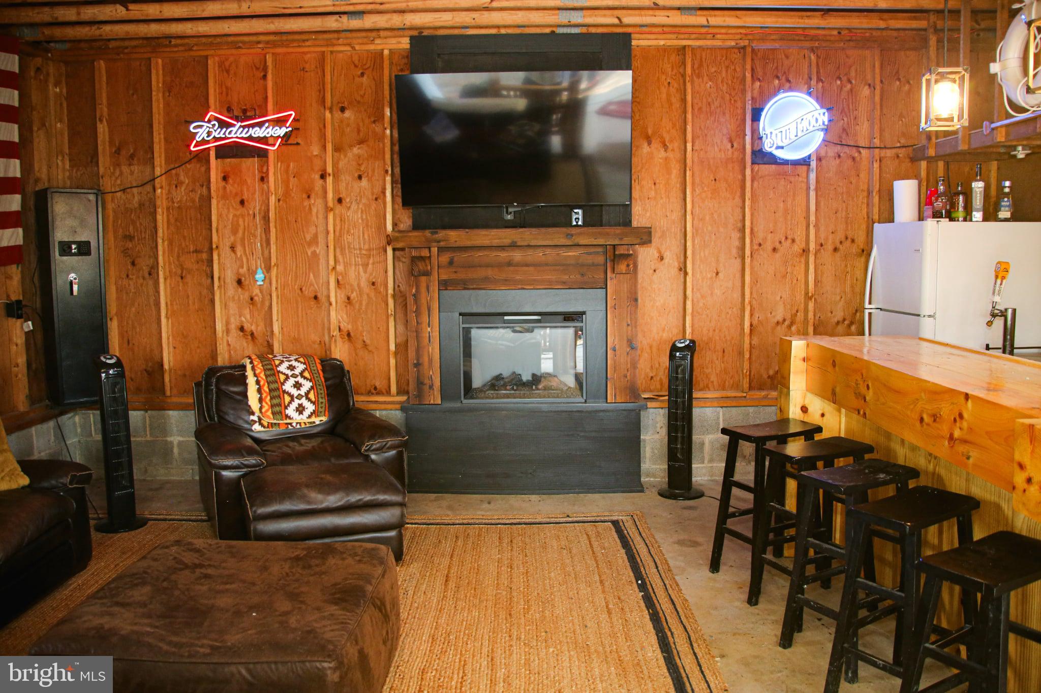 120 Rock Lodge Road McHenry, MD 21541 - Photo 22 of 23 a living room with furniture and a flat screen tv
