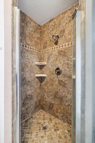 a view of a big room with table and chairs