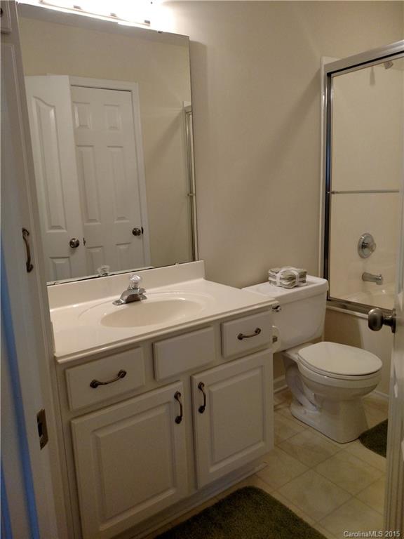 1429 Autumn Ridge Lane, Unit 443 Fort Mill, SC 29708 - Photo 22 of 24 a bathroom with a sink toilet and mirror