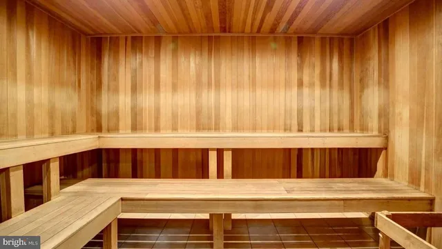 a view of entryway with wooden walls