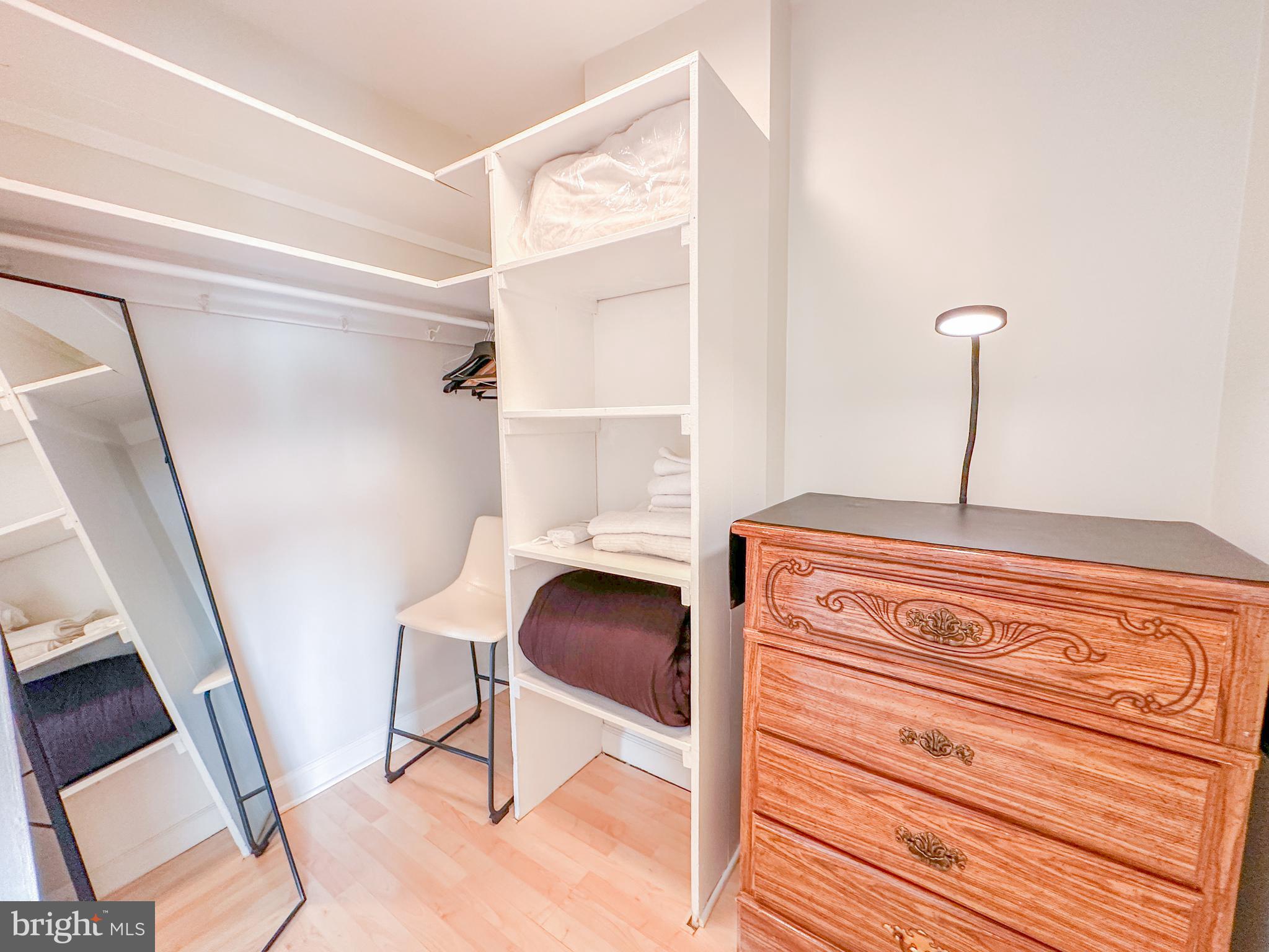 1111 Arlington Boulevard, Unit 615 Arlington, VA 22209 - Photo 10 of 37 a bedroom with a bed and a window