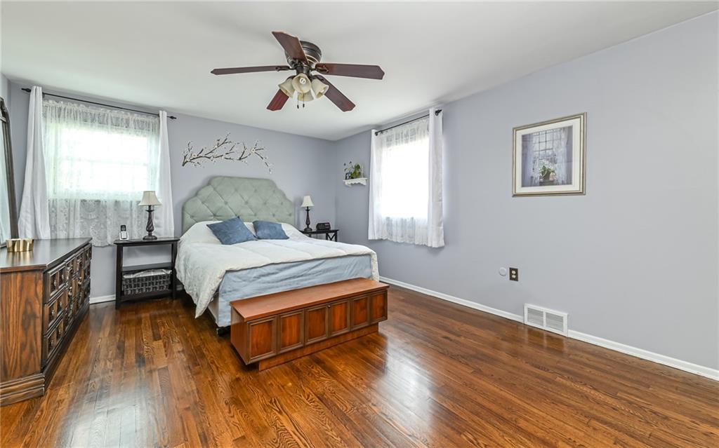 463 Inwood Road Pittsburgh, PA 15237 - Photo 20 of 47 a bedroom with a bed and wooden floor