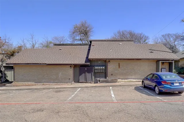 a car parked in front of a building