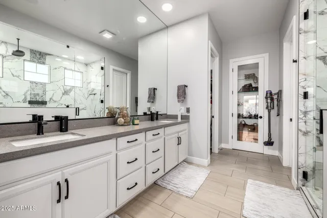a view of a livingroom with furniture and a flat screen tv