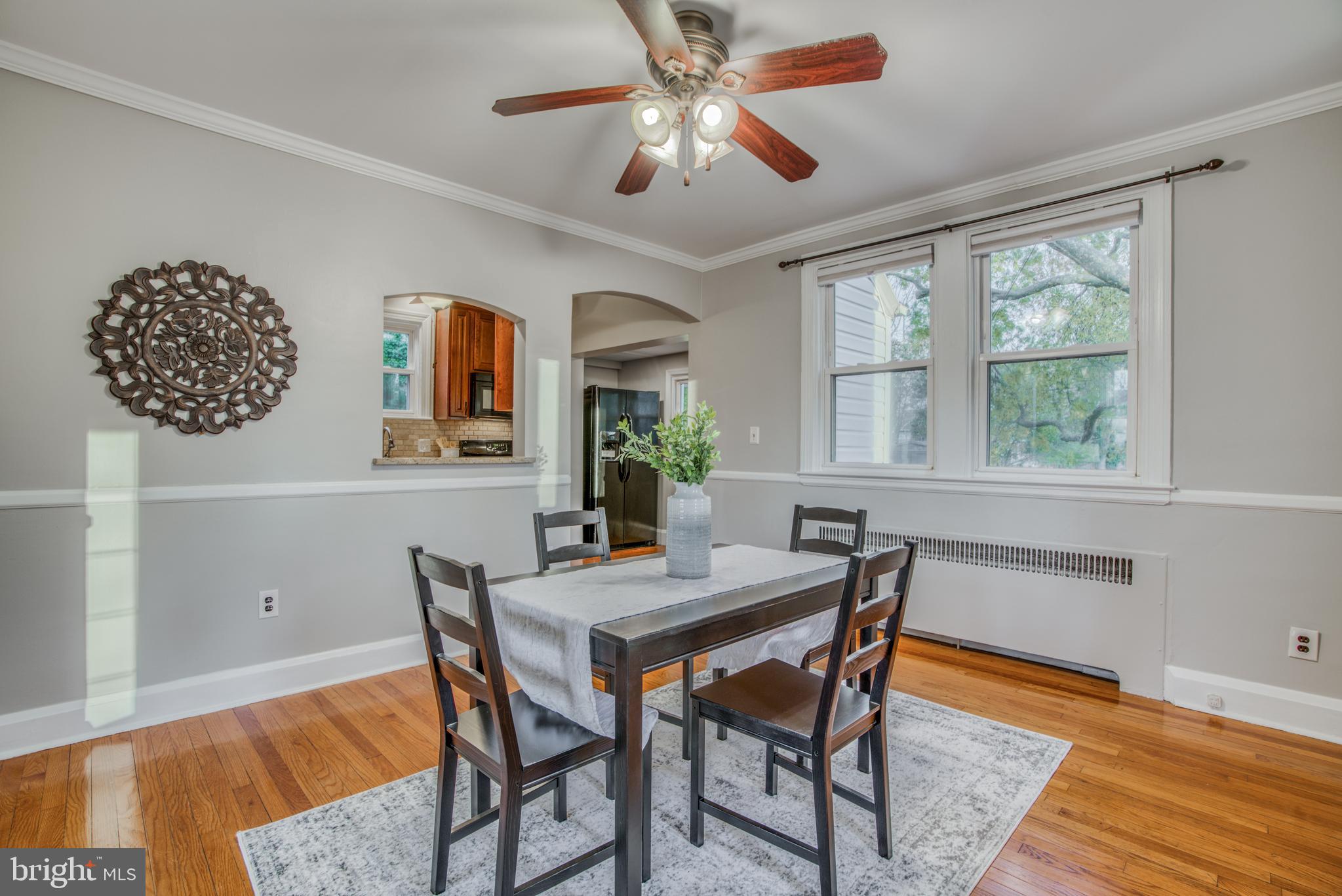 7301 Old Harford Road Baltimore, MD 21234 - Photo 5 of 24 LOVELY HARDWOODS IN DR W/ PASS THRU WINDOW TO KIT