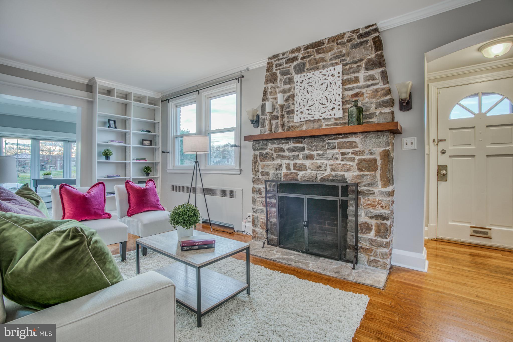 7301 Old Harford Road Baltimore, MD 21234 - Photo 7 of 24 ORIGINAL FLOOR TO CEILING STONE FIREPLACE