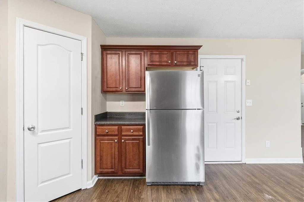 2827 Riders Court Northeast Dacula, GA 30019 - Photo 13 of 41 a utility room with wooden floor