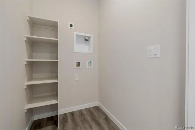 a front view of a house with a garage