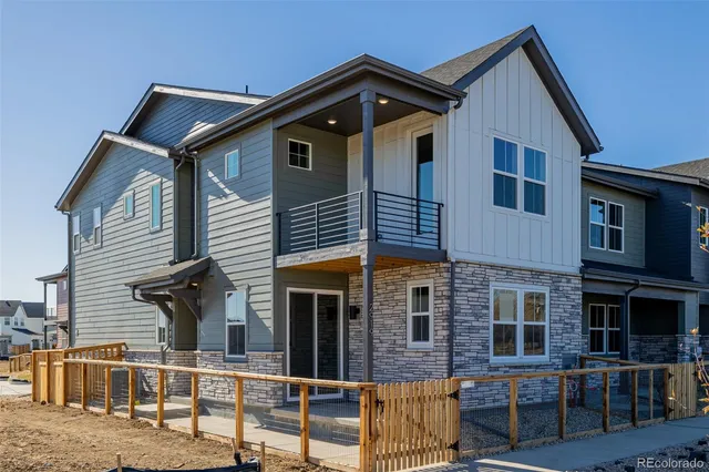 a front view of a house with glass windows