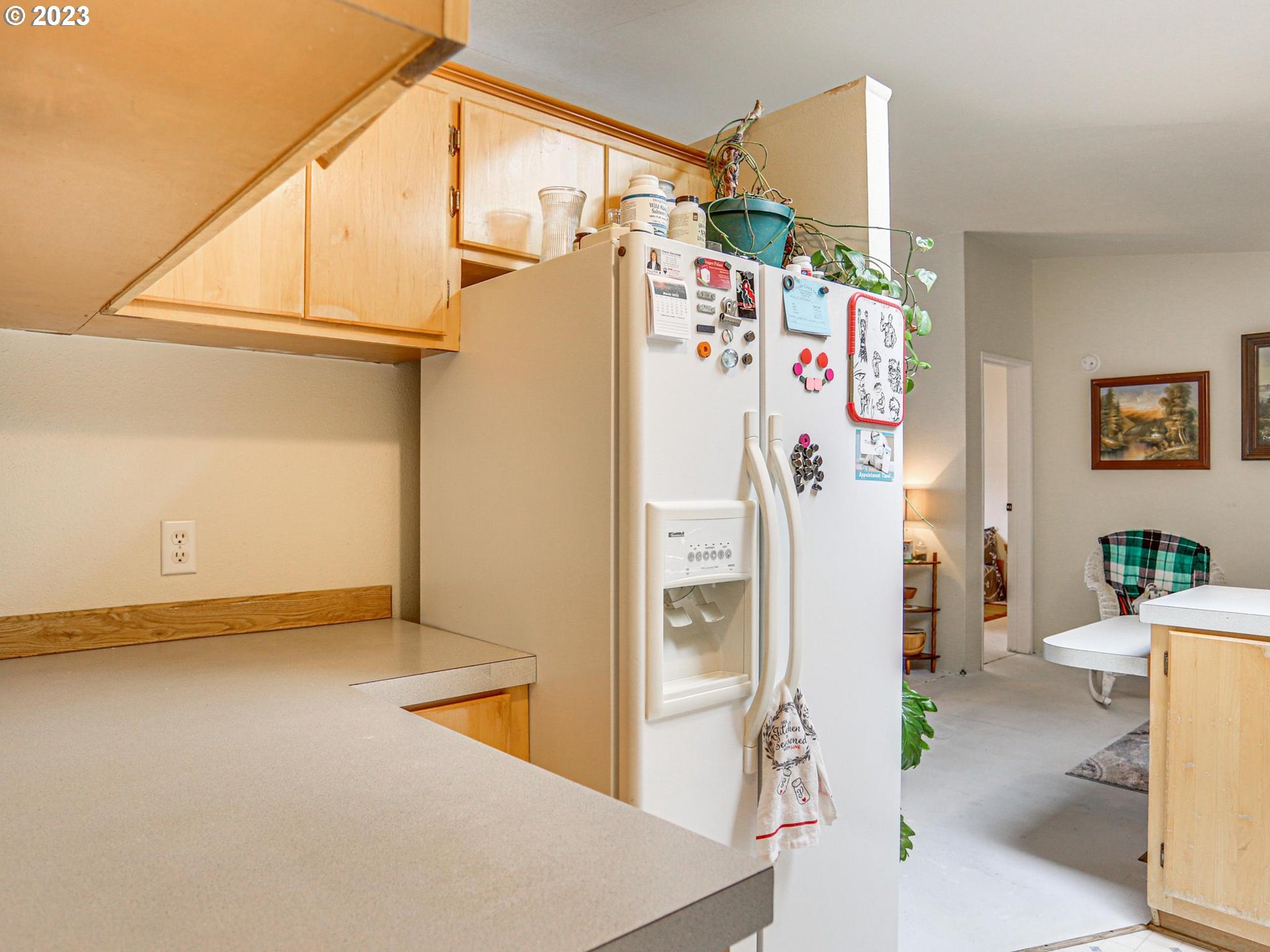 1819 Southeast Orient Drive, Unit 1 Gresham, OR 97080 - Photo 12 of 30 a view of living room with furniture and a refrigerator