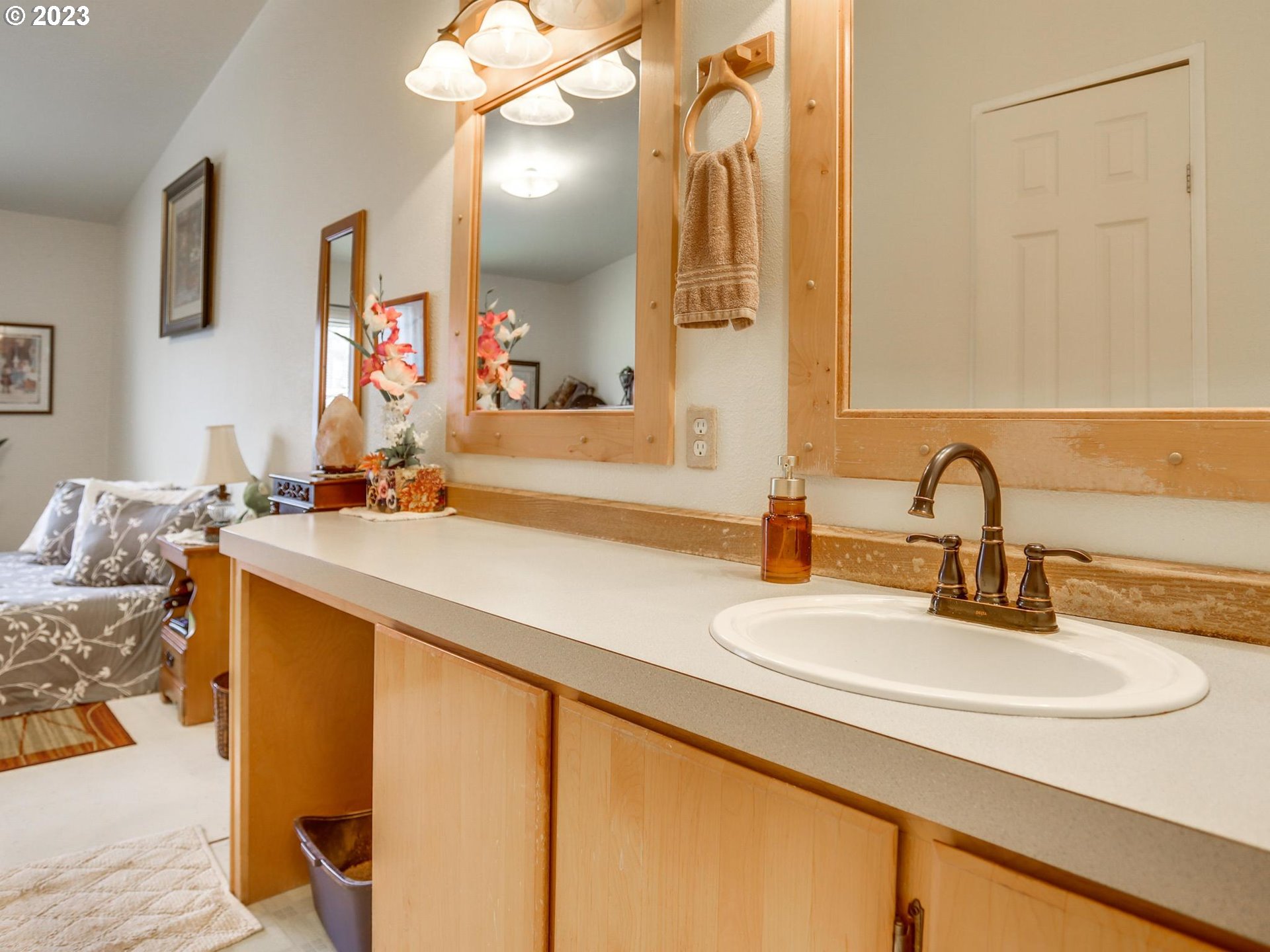 1819 Southeast Orient Drive, Unit 1 Gresham, OR 97080 - Photo 16 of 30 a bathroom with a sink and a mirror