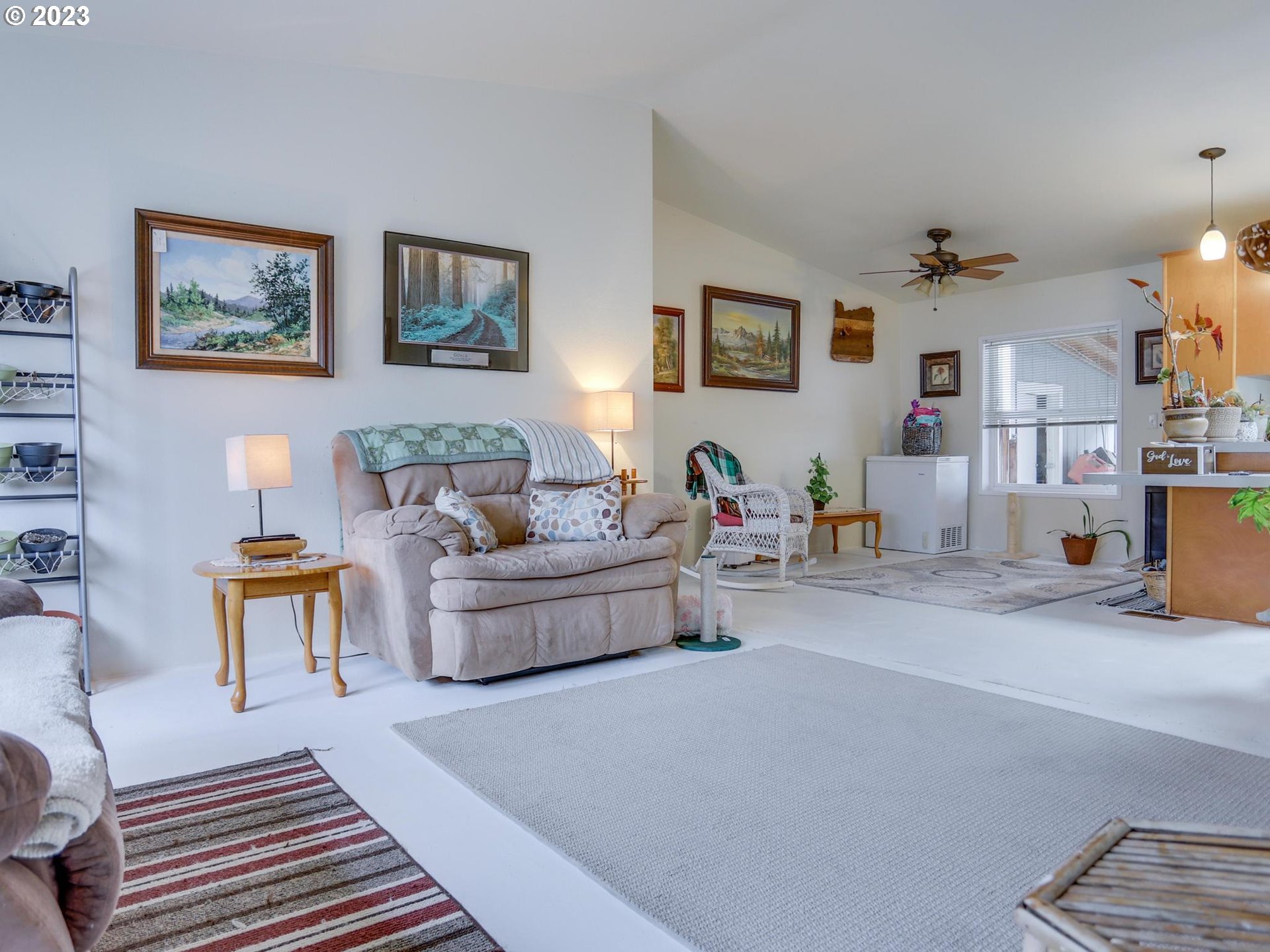 1819 Southeast Orient Drive, Unit 1 Gresham, OR 97080 - Photo 6 of 30 a living room with furniture and a couch