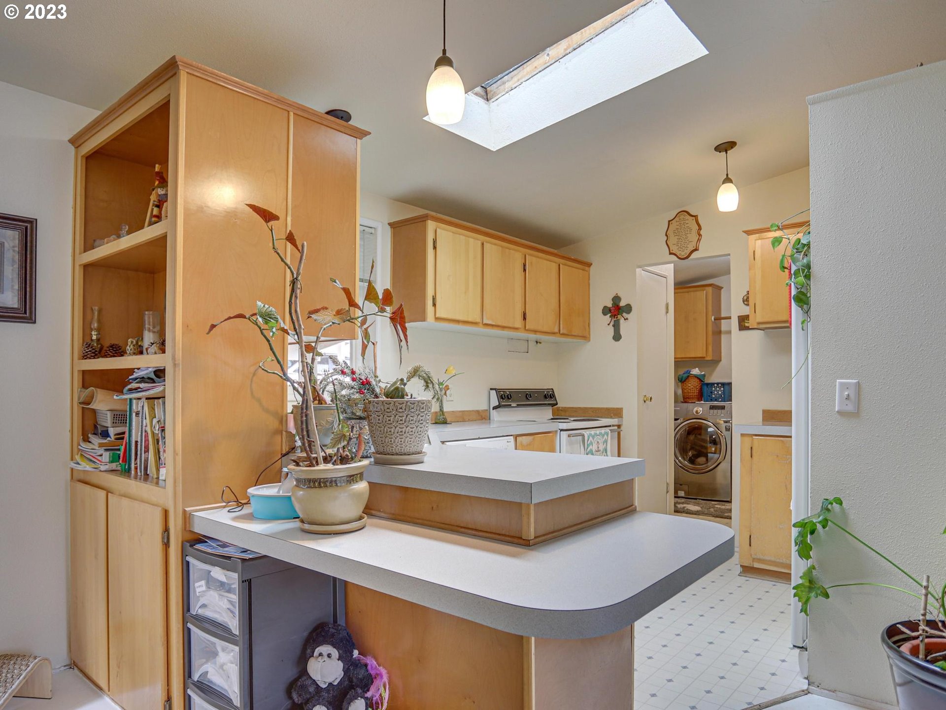 1819 Southeast Orient Drive, Unit 1 Gresham, OR 97080 - Photo 7 of 30 a kitchen with a sink appliances and cabinets