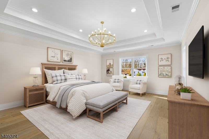 502 Tiffany Way Watchung, NJ 07069 - Photo 19 of 41 a spacious bedroom with a bed and a flat screen tv