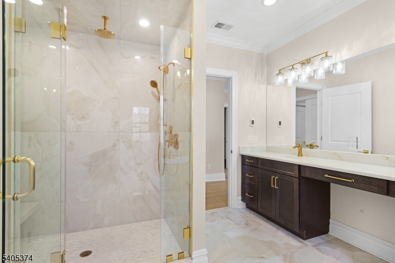 502 Tiffany Way Watchung, NJ 07069 - Photo 24 of 41 a bathroom with a double vanity sink mirror and shower