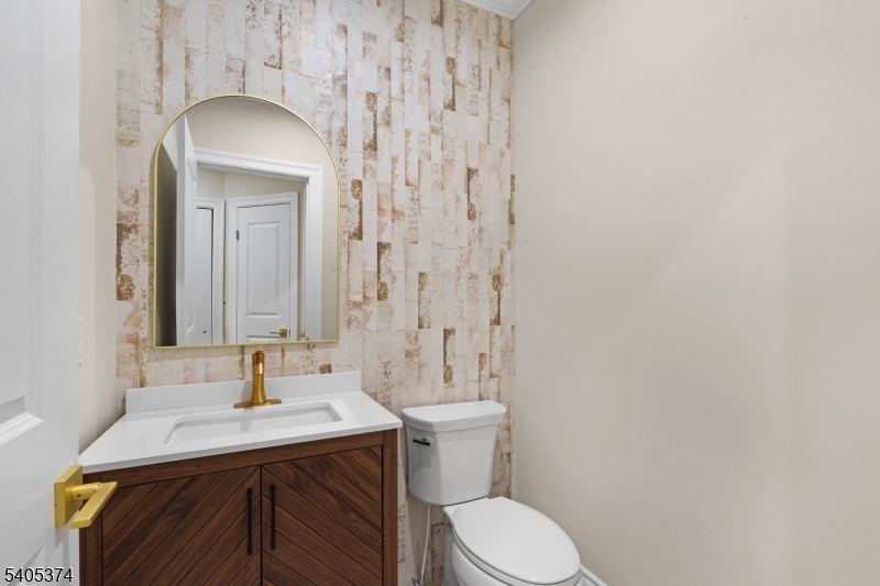 502 Tiffany Way Watchung, NJ 07069 - Photo 31 of 41 a bathroom with a sink and a toilet