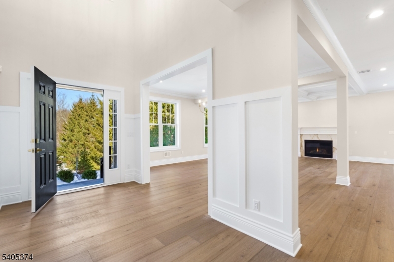 502 Tiffany Way Watchung, NJ 07069 - Photo 35 of 41 wooden floor in an empty room with a window