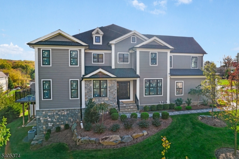 502 Tiffany Way Watchung, NJ 07069 - Photo 38 of 41 a front view of a house with garden
