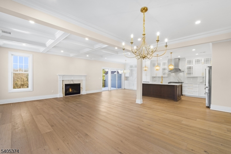 502 Tiffany Way Watchung, NJ 07069 - Photo 9 of 41 a view of a kitchen with a sink and a fireplace
