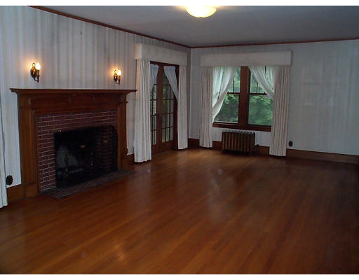 44 Concord Road Billerica, MA 01821 - Photo 7 of 12 a living room with furniture and a fireplace