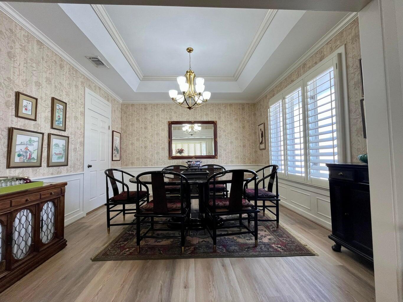 8 Westridge Square Plainview, TX 79072 - Photo 17 of 41 a view of a dining room with furniture window and wooden floor