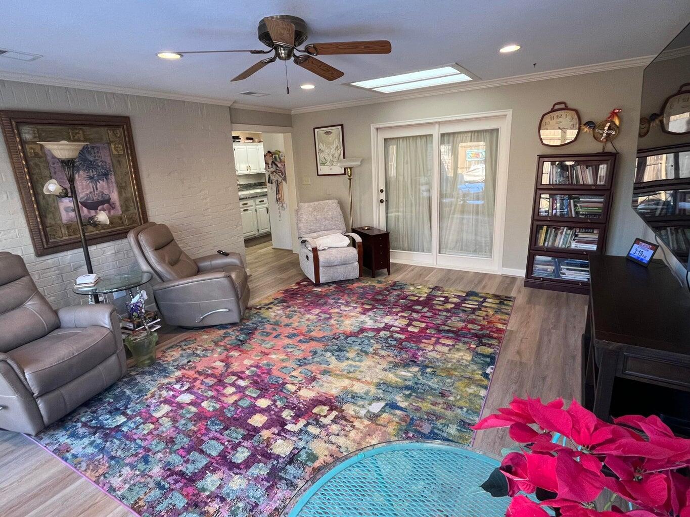 8 Westridge Square Plainview, TX 79072 - Photo 24 of 41 a living room with furniture and a flat screen tv
