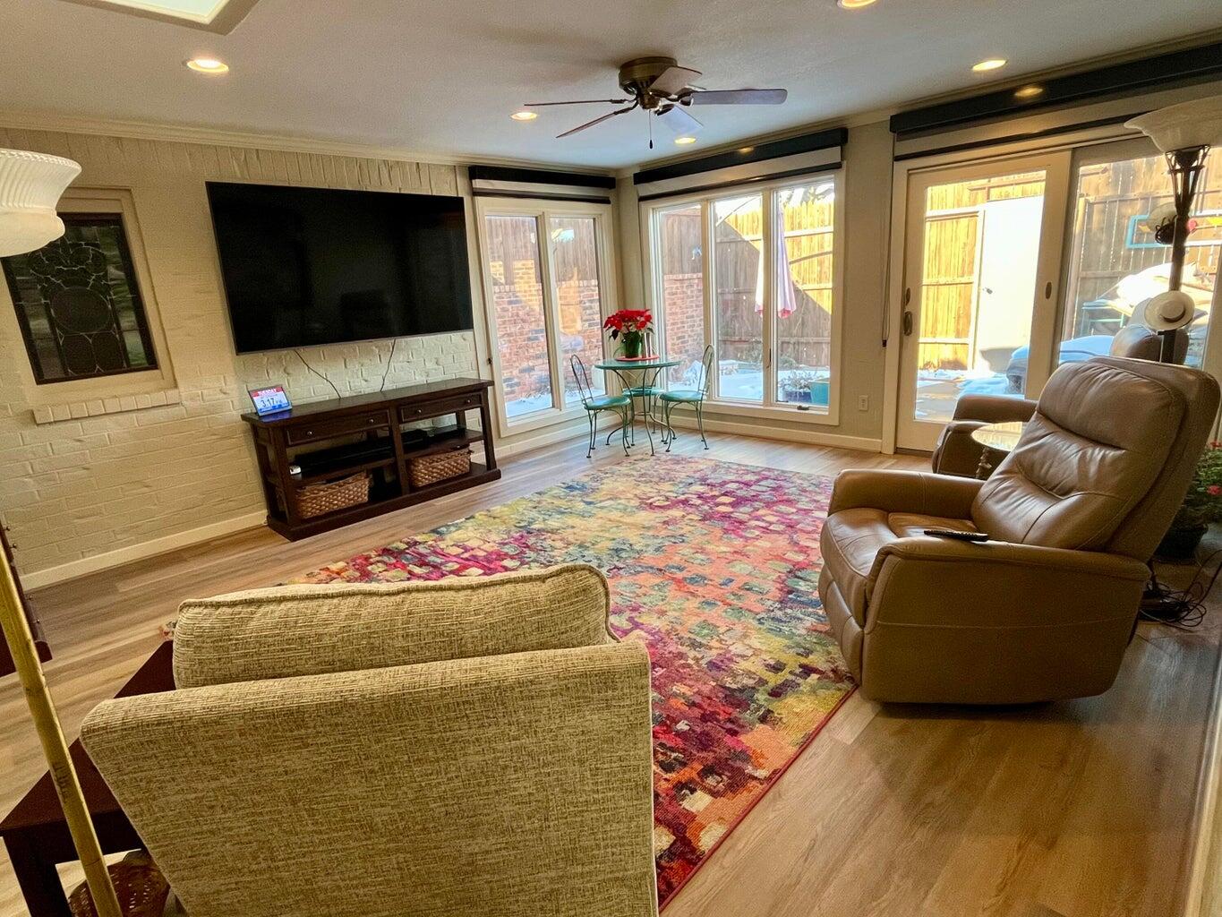 8 Westridge Square Plainview, TX 79072 - Photo 25 of 41 a living room with furniture and a flat screen tv