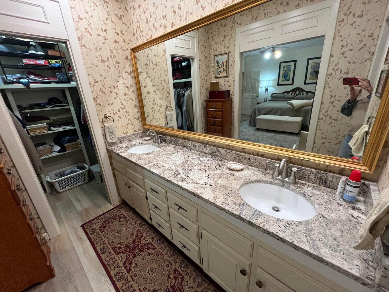 8 Westridge Square Plainview, TX 79072 - Photo 29 of 41 a bathroom with a granite countertop sink and a mirror
