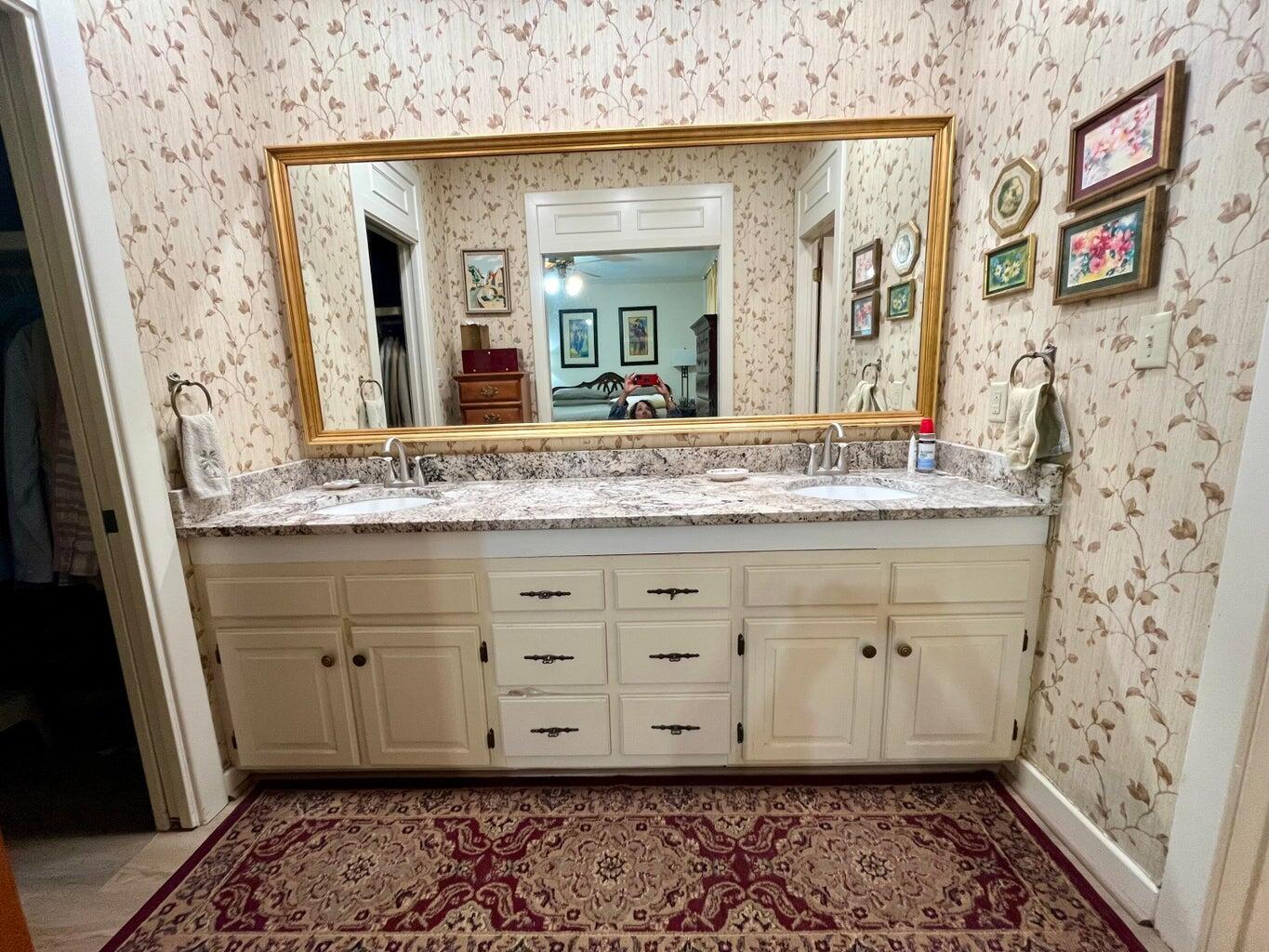 8 Westridge Square Plainview, TX 79072 - Photo 30 of 41 a bathroom with a sink and a mirror