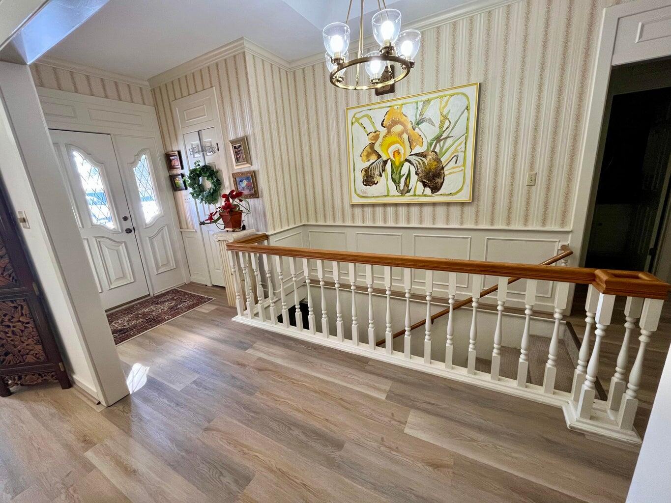 8 Westridge Square Plainview, TX 79072 - Photo 10 of 41 a view of entryway with wooden floor
