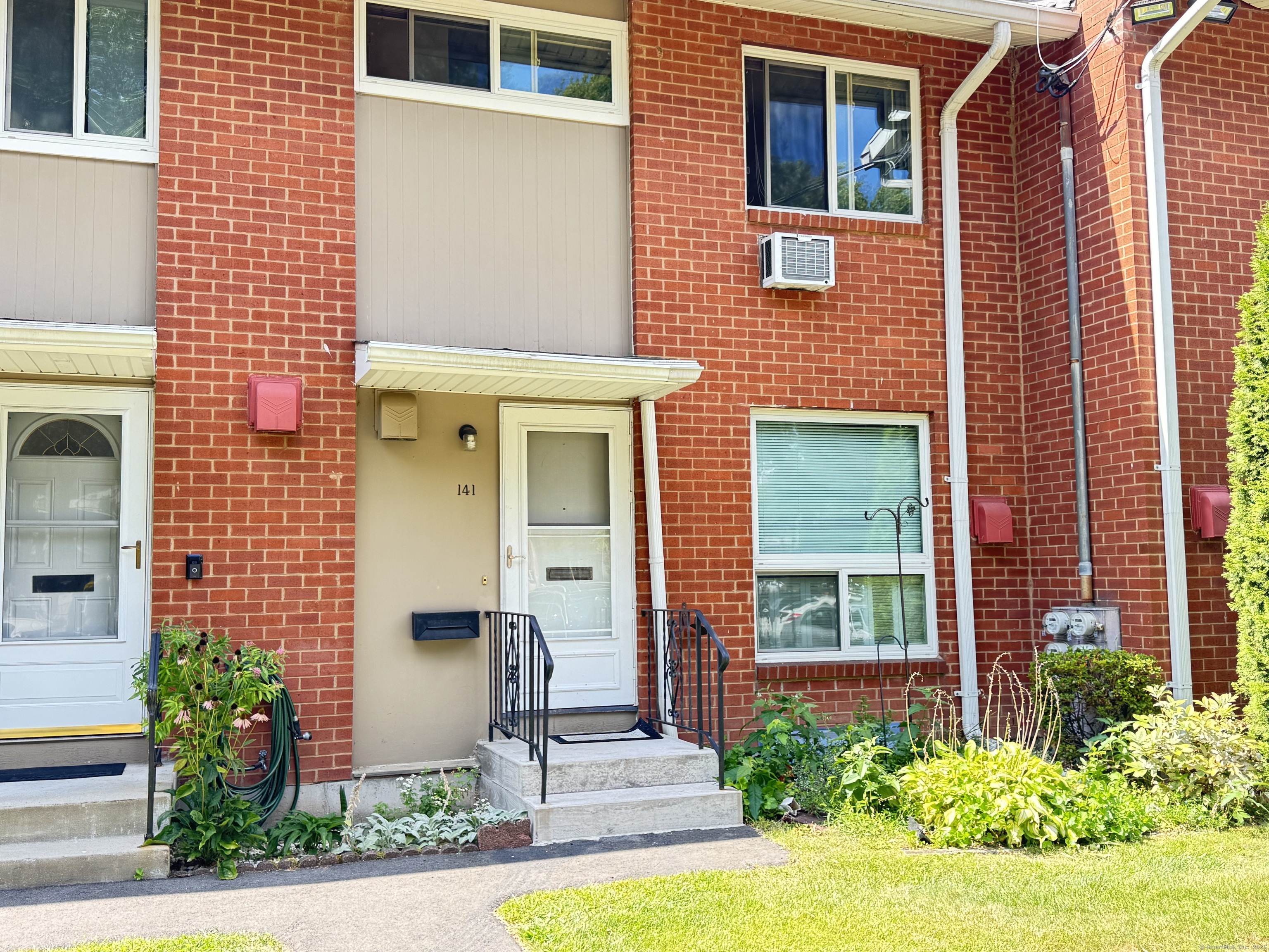 a front view of a house having yard