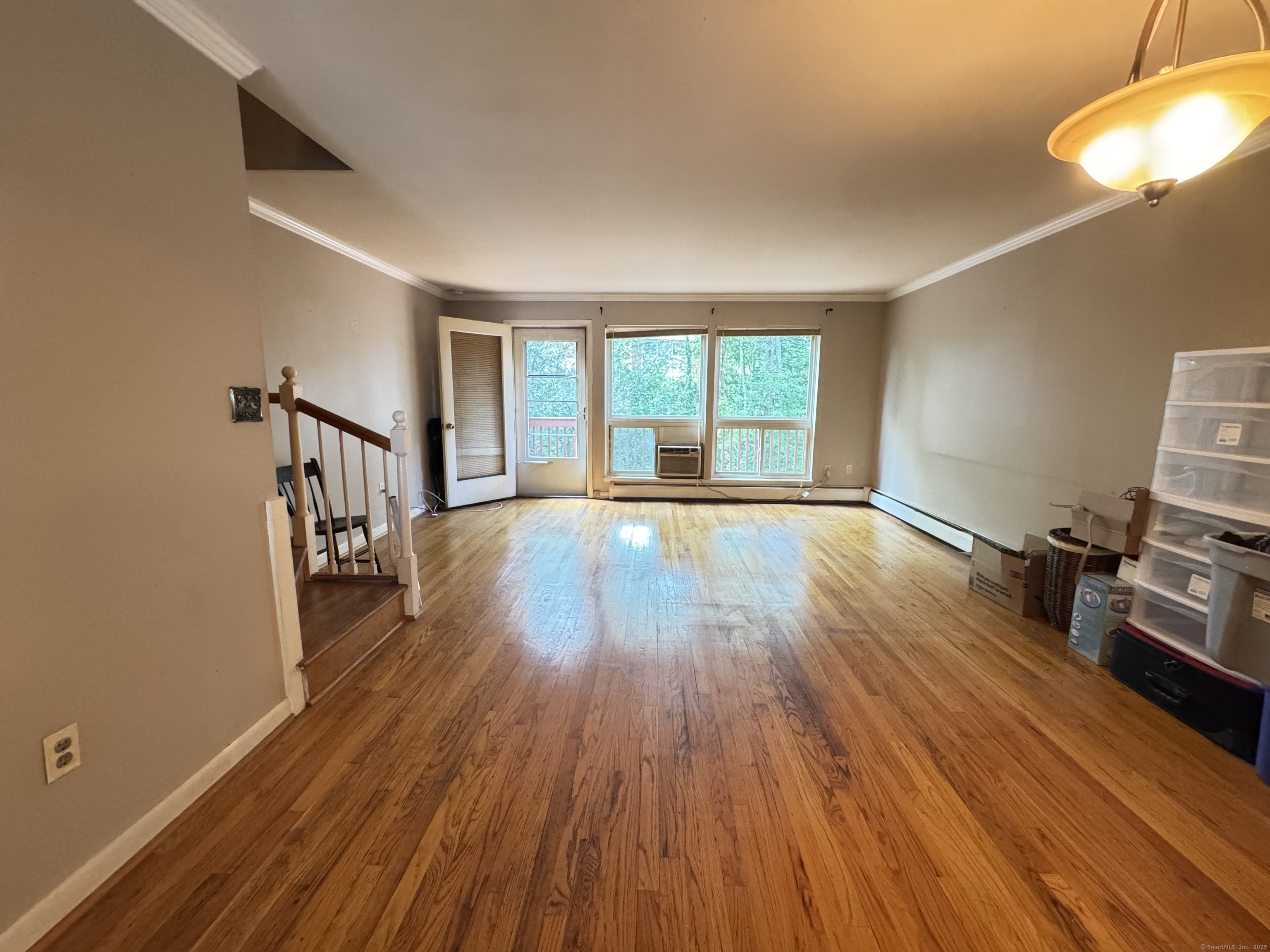 141 Worth Avenue Hamden, CT 06518 - Photo 4 of 17 a view of empty room with wooden floor