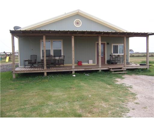 222 Joey Taft, TX 78390 - Photo 2 of 10 a view of a house with lounge chair