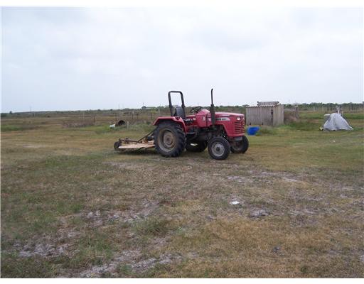 222 Joey Taft, TX 78390 - Photo 3 of 10 a view of a cars in front of a house