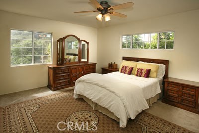 1852 Alpha Road Glendale, CA 91208 - Photo 6 of 13 a bedroom with a bed and a large window