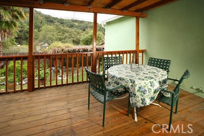 1852 Alpha Road Glendale, CA 91208 - Photo 8 of 13 a view of a balcony with table and chairs