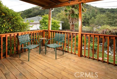 1852 Alpha Road Glendale, CA 91208 - Photo 9 of 13 a view of a chairs on wooden deck