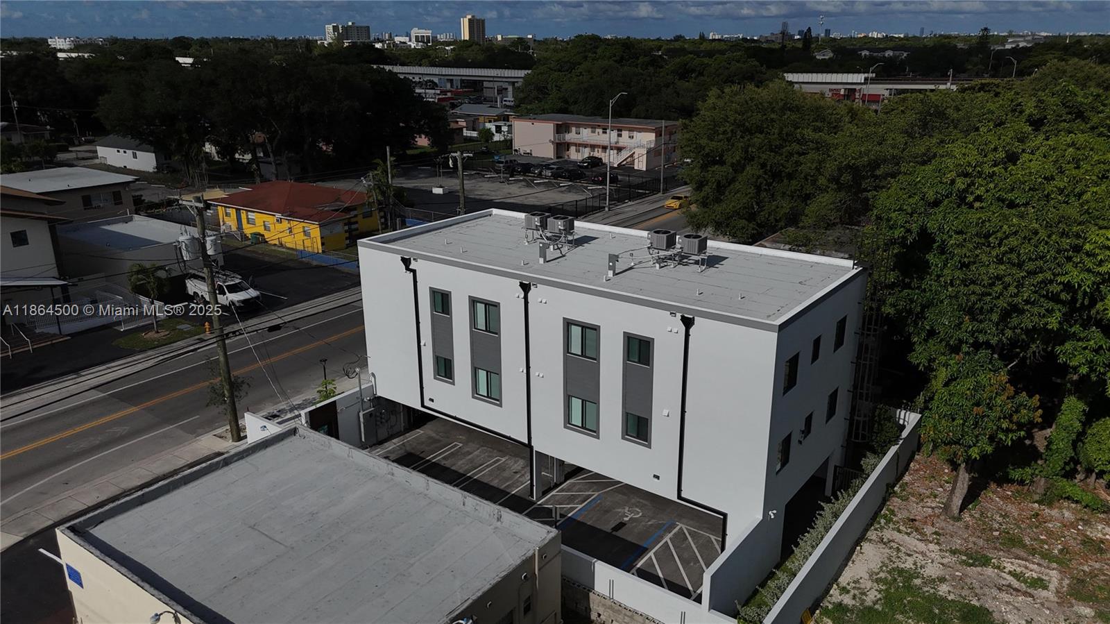2782 Northwest 46th Street, Unit 5 Miami, FL 33142 - Photo 6 of 18 a roof deck with sitting area